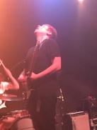 Frontman, Adam bringing the Arts Club to life